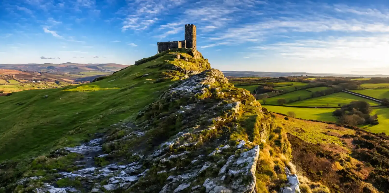 Hilltop church on Dartmoor with fields stretching to the horizon