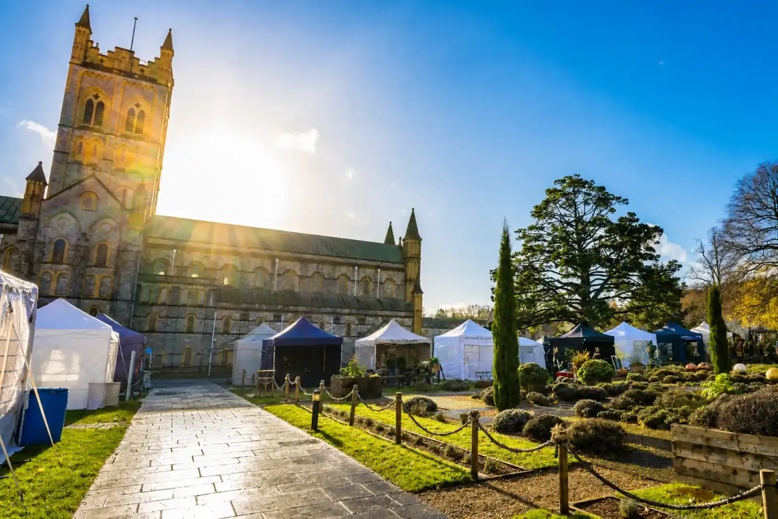 Buckfast Abbey church and grounds in low winter sunshine